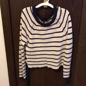Striped sweater with ribbon on the sides